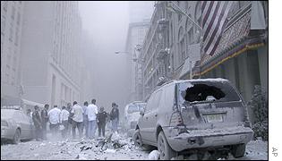 Dust and debris cloud the air near the site of the terrorist attack on the World Trade Center